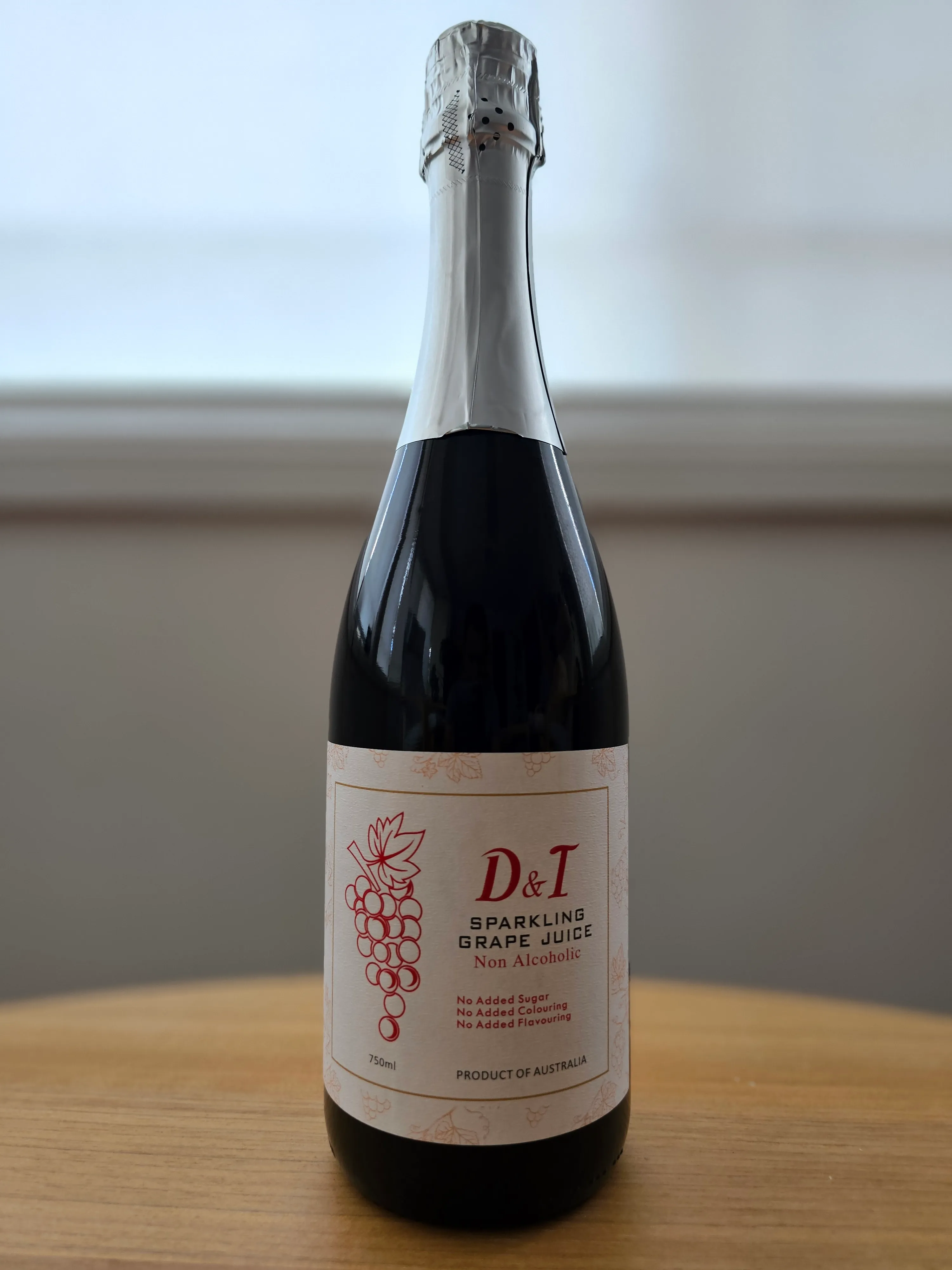 D & T SPARKLING GRAPE JUICE